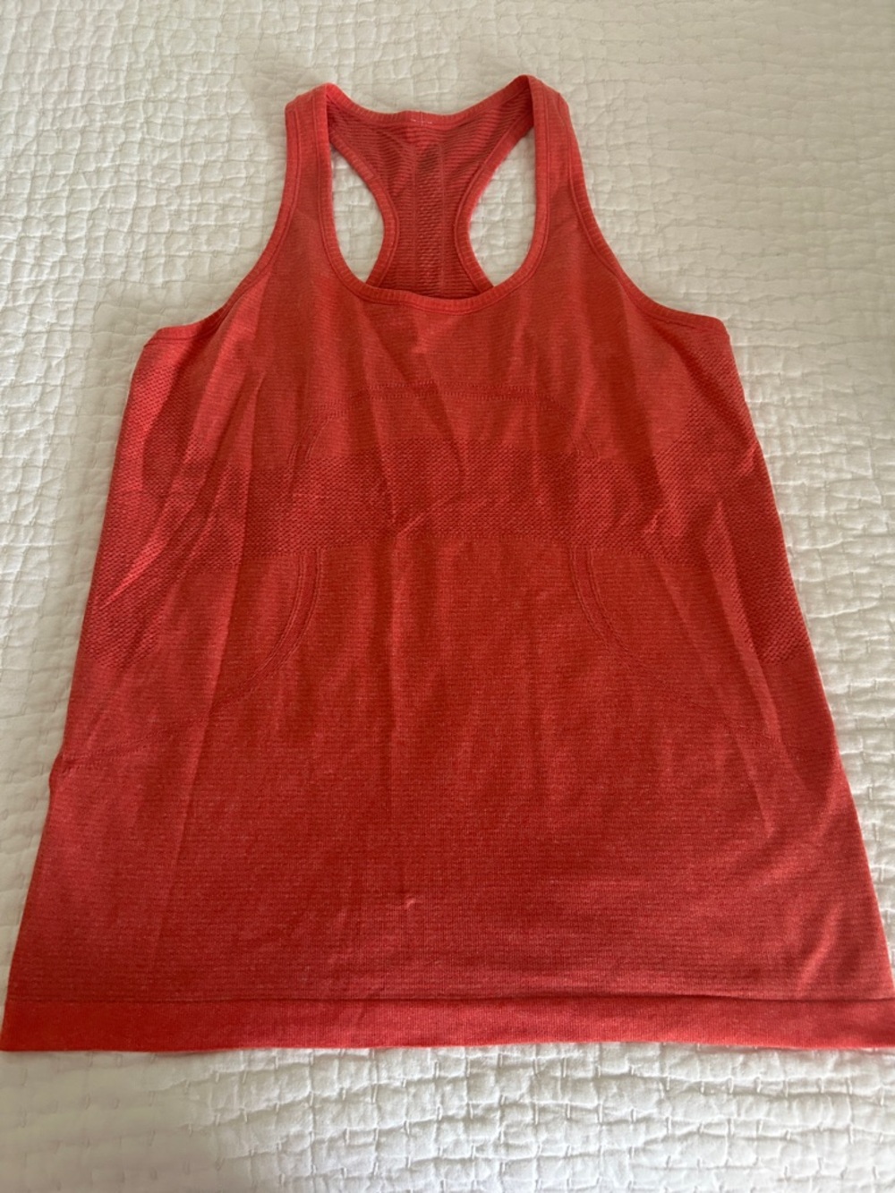 Lululemon Women’s coral Racerback Tank Top - hip length